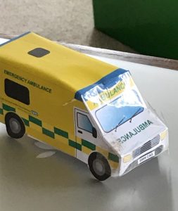 Small handmade paper ambulance